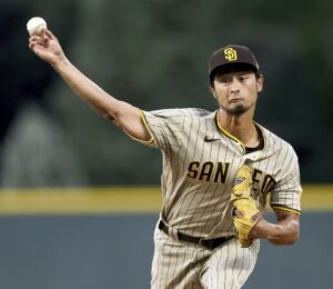 NISHINOMIYA, Japan - Farsad Darvish (L) and his wife Ikuyo (C