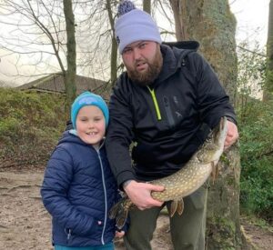 Darts Star Michael Smith with his son