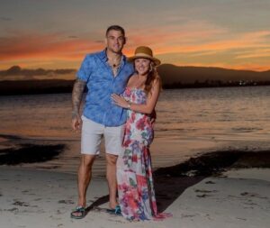 Dustin Poirier with his wife 