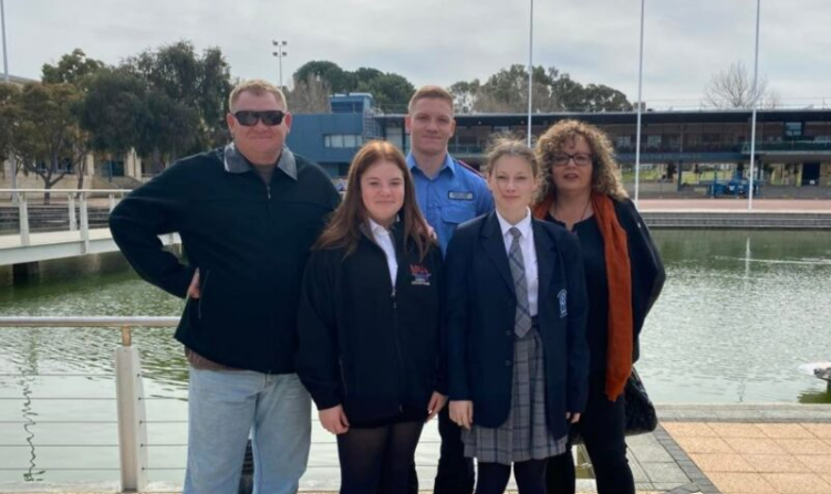 Brody Wood Kenney with his parents and siblings before March 2022