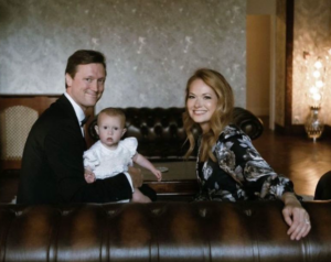 Gillian Turner, Alex Kramer, and their daughter, Lucia, make up a family picture