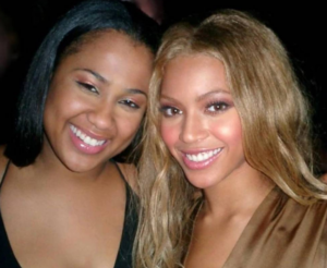 Angie with her cousin Beyoncé Knowles during one of her concerts