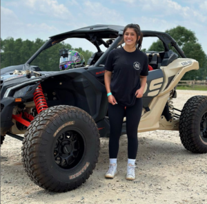 Hailie Deegan driving a @canamoffroad.