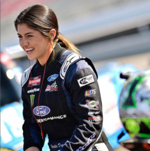 Hailie Deegan lifting her spirits with a smile.