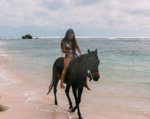 Lilliana Bowrey riding a horse.