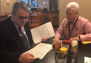 Robert W Smith looking at his musical notes.