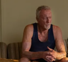 Slim Halliday’s character played by  Bryan Brown in the Netflix series